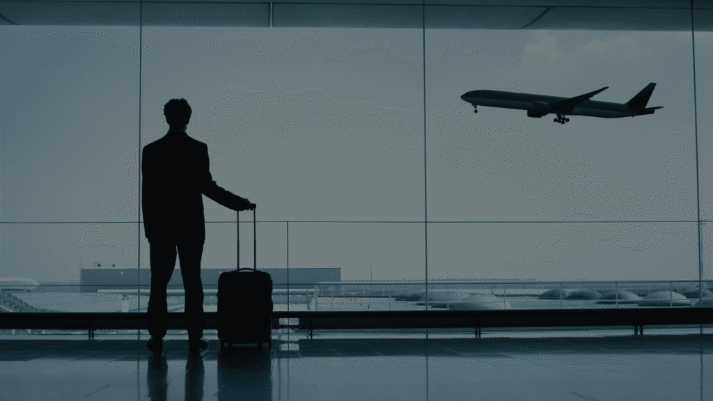 man waiting for plane