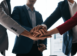 Team hands coming together