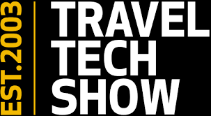 Black graphic with white “Travel Tech Show” text and a yellow vertical bar reading “Est. 2003.”