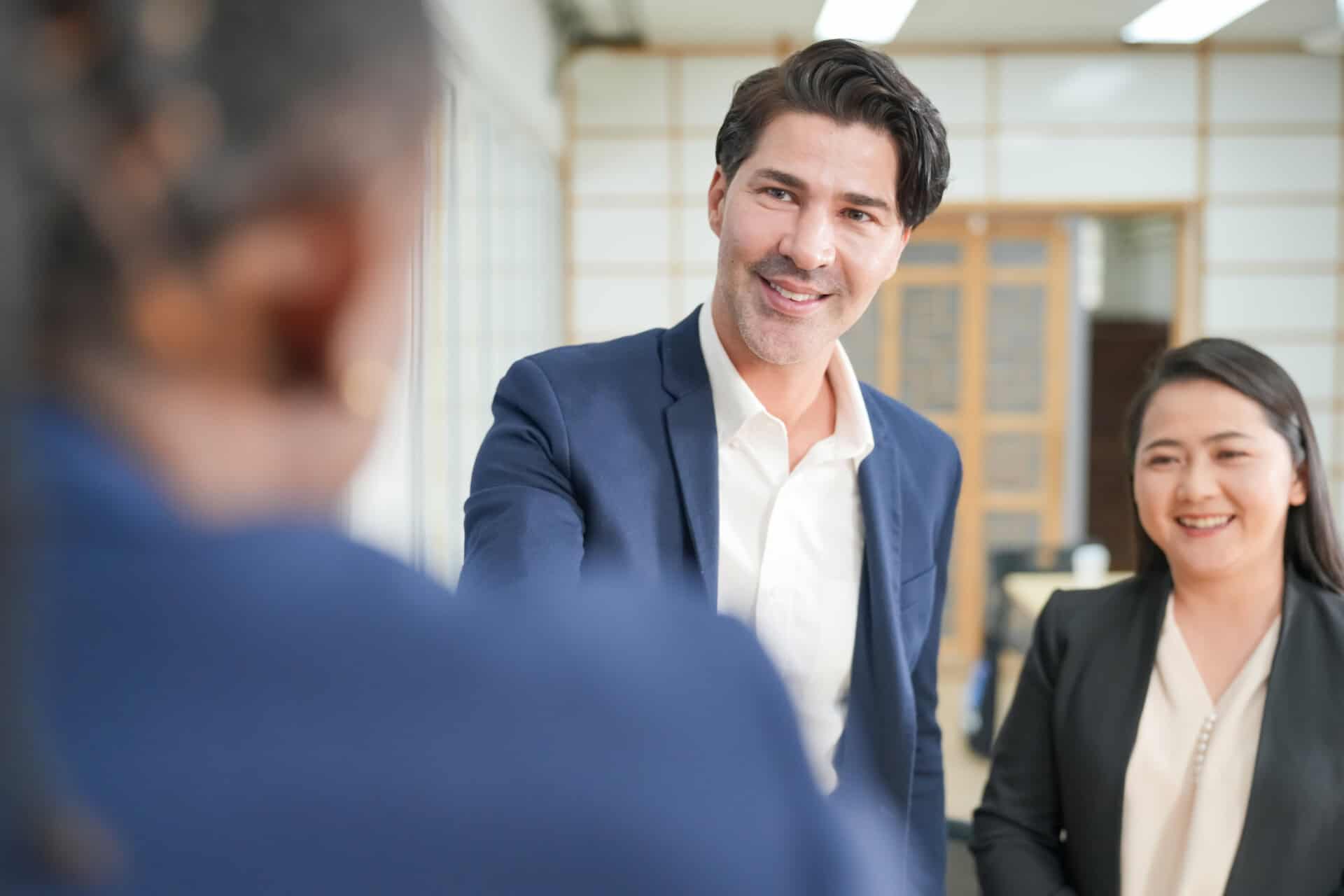 Travel agency professionals building hotel partnerships to increase commission revenue and business growth