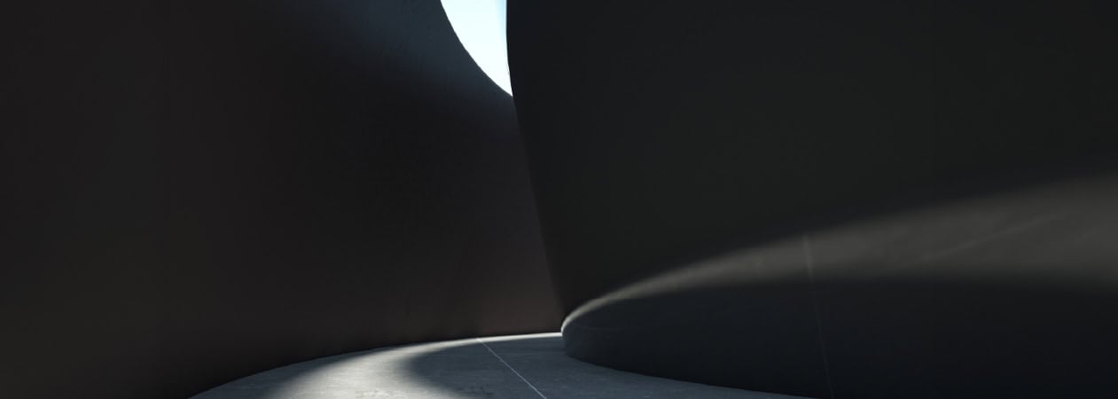 Curved dark architectural walls frame a minimalist concrete walkway, with soft sunlight filtering through a narrow opening above.